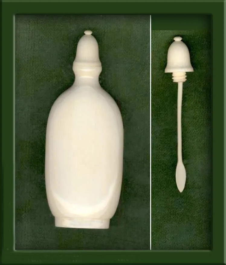 MIIV101-Vintage carved bottle with bottle top and spoon