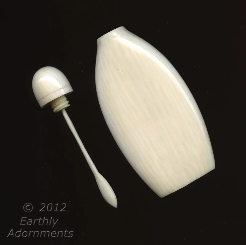 MIIV101-Vintage carved bottle with bottle top and spoon